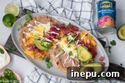 Easy Huevos Rancheros with a fried egg and fresh toppings