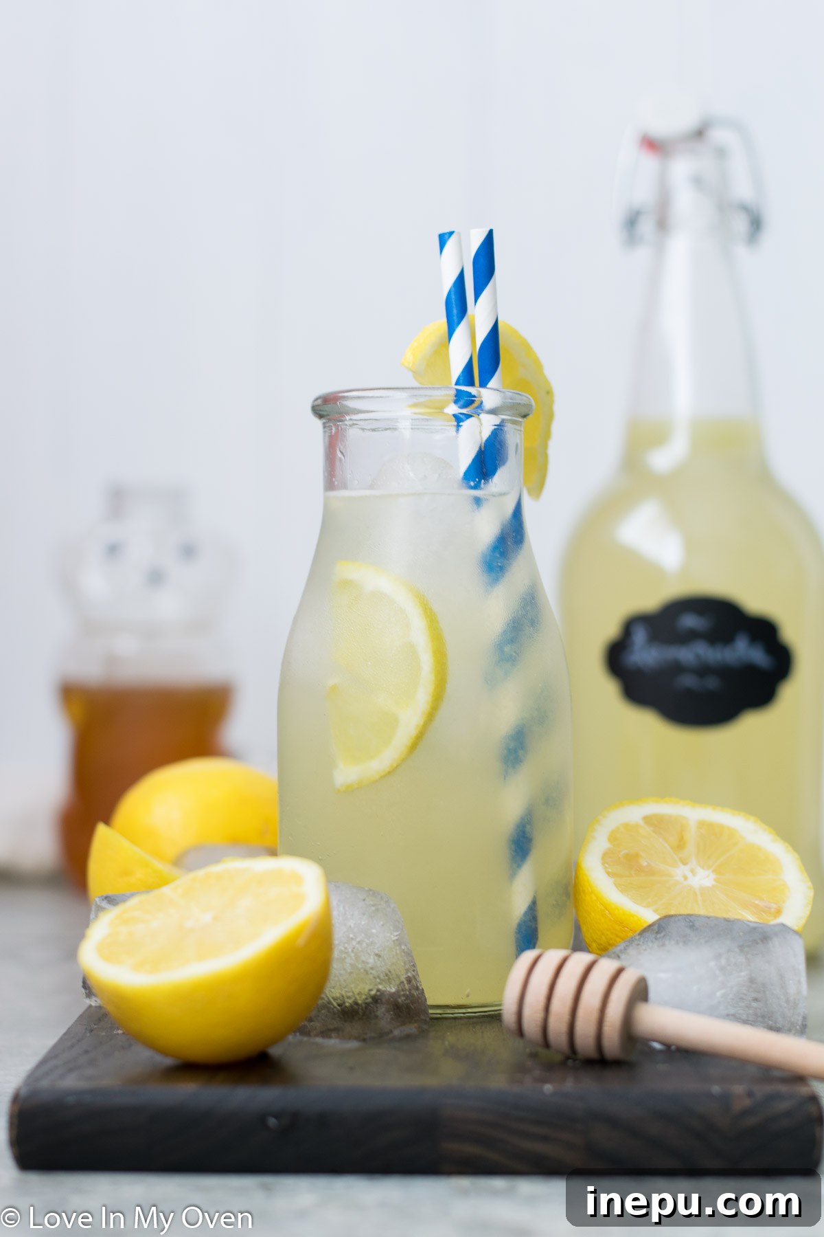 Effortless Honey Lemonade 8 Two glasses of honey lemonade with lemon slices, ready to drink