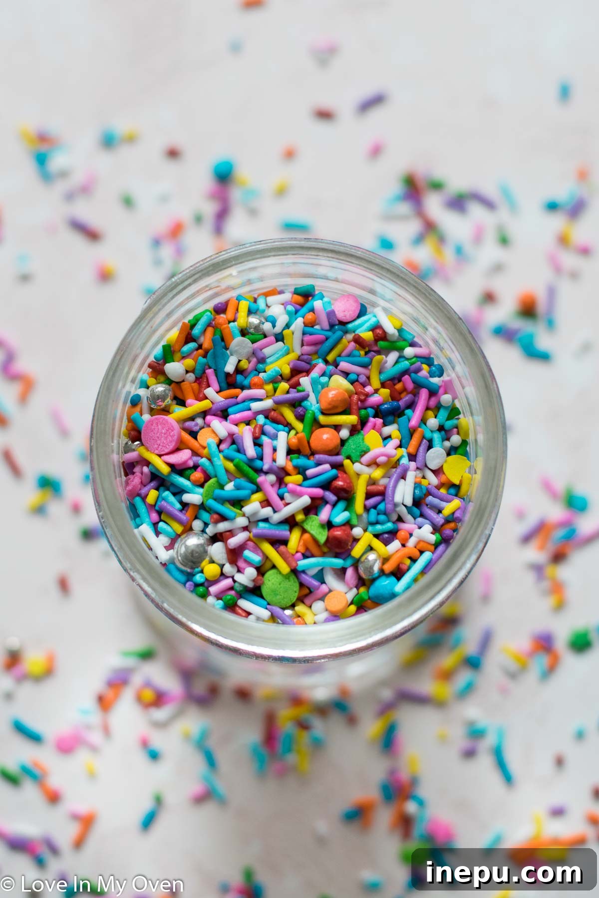 Whimsical Sprinkled Sugar Cookies 4 A bowl filled with a colorful array of sprinkles, ready to be added to the cookie dough.