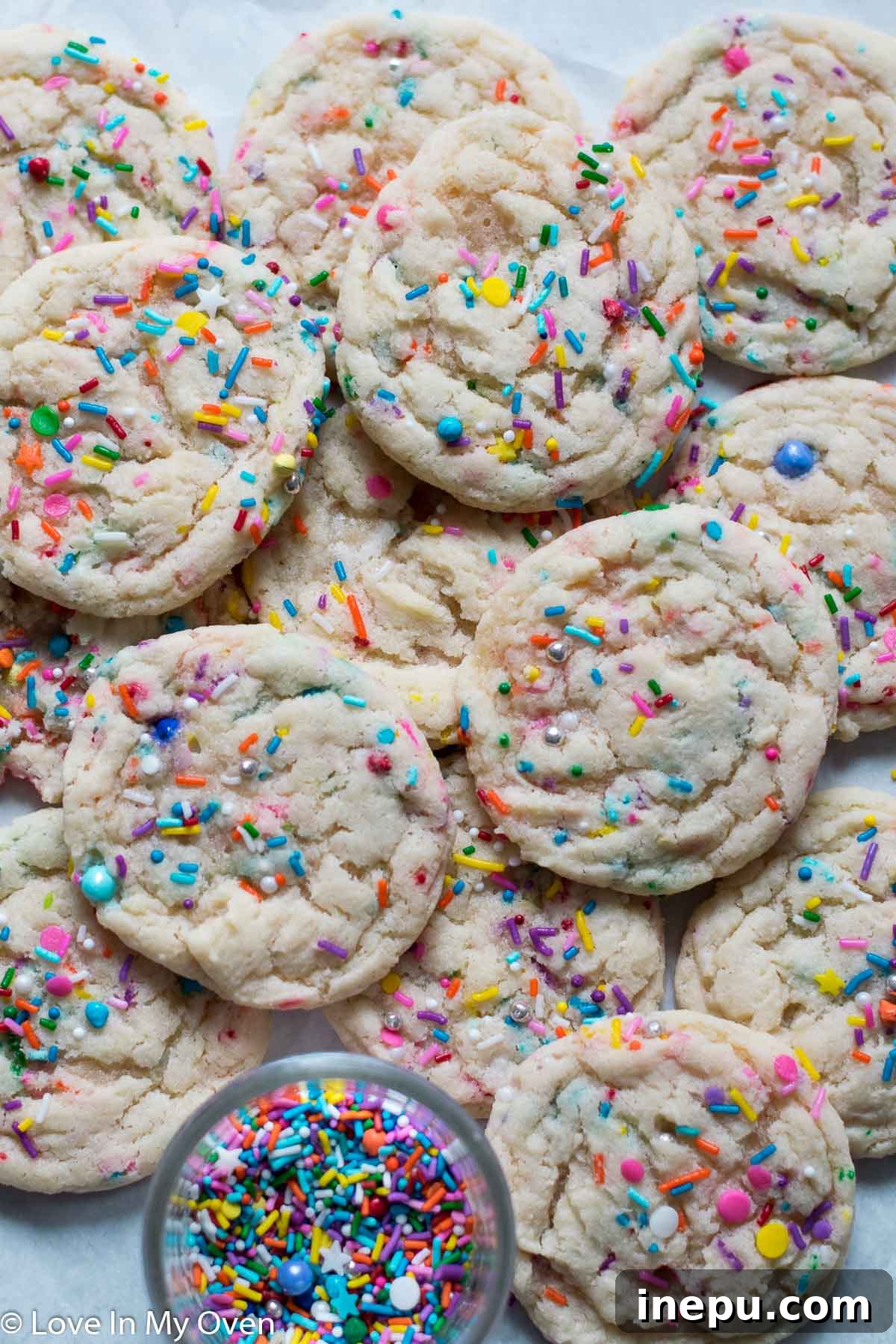 Whimsical Sprinkled Sugar Cookies 8 Another appealing shot of sprinkle sugar cookies on a plate, emphasizing their colorful and inviting appearance.