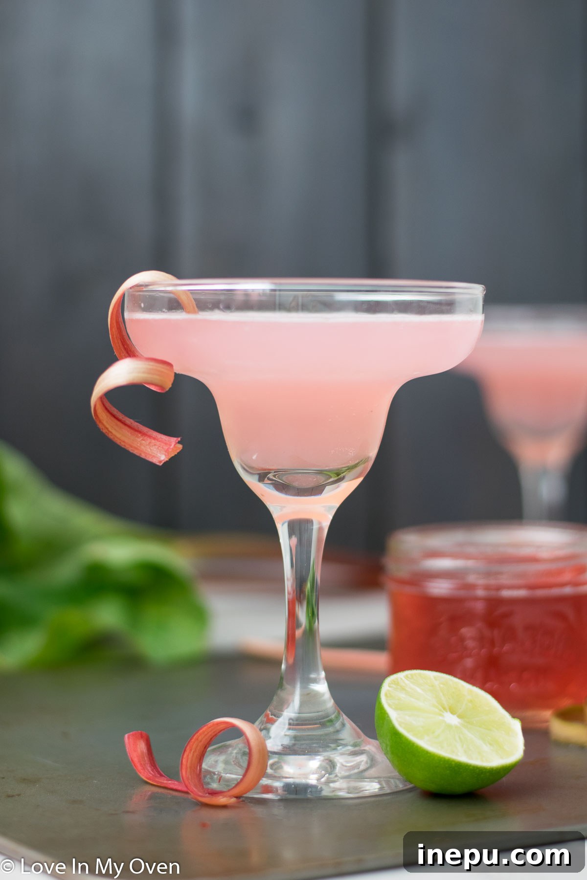 Refreshing Rhubarb Gimlet 2 Rhubarb Gimlet with fresh rhubarb stalks, a refreshing summer cocktail