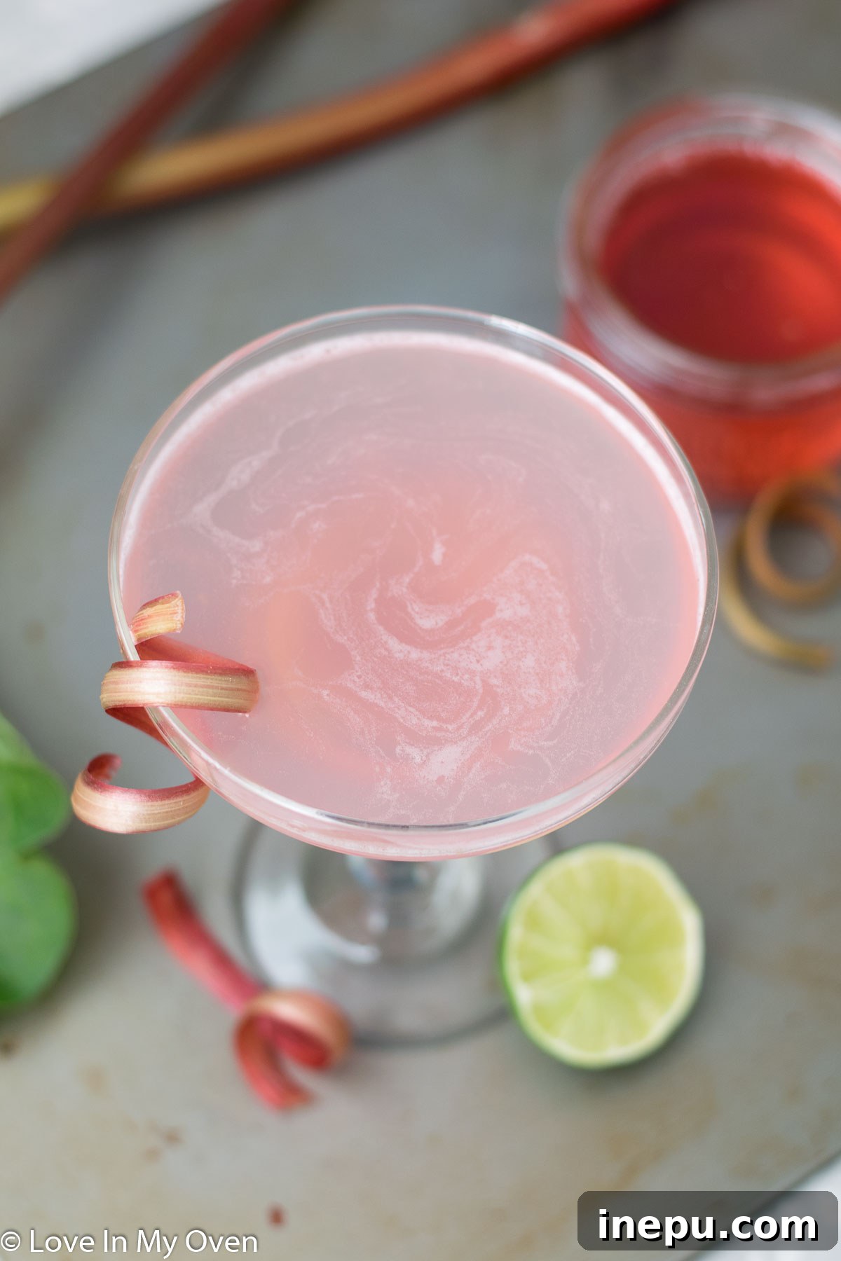 Refreshing Rhubarb Gimlet 3 Close-up of a Rhubarb Gimlet cocktail glass