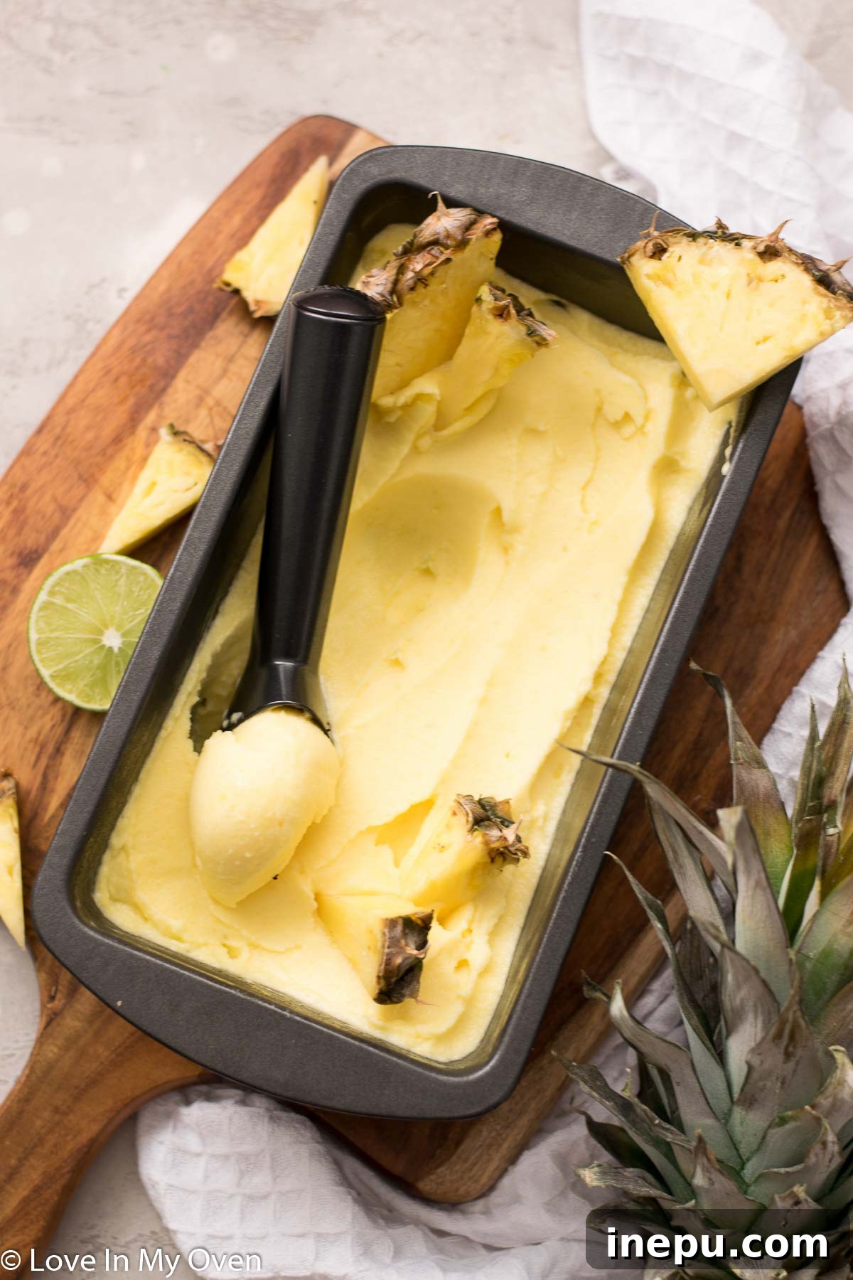 Tropical Pineapple Chill 2 Freshly made pineapple sorbet in a bowl, garnished with mint.