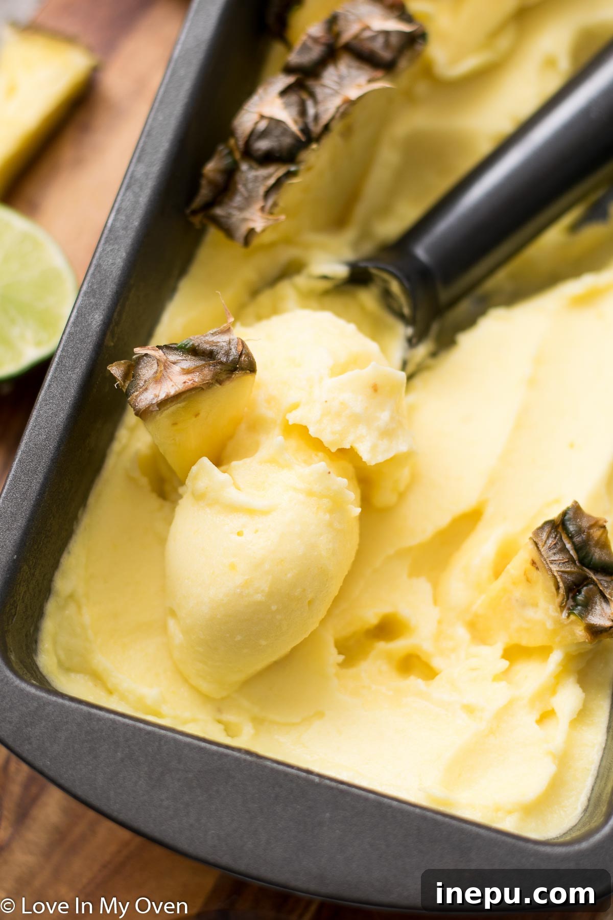 Tropical Pineapple Chill 8 Two bowls of pineapple sorbet side by side, garnished with fresh mint.