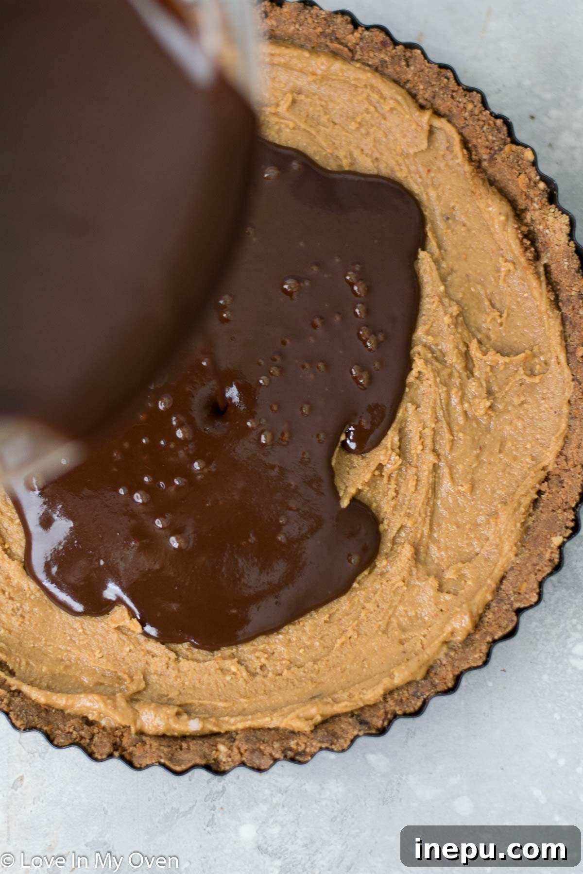Salted Pretzel Caramel Chocolate Tart 7 Finished Caramel Chocolate Pretzel Tart ready to be sliced