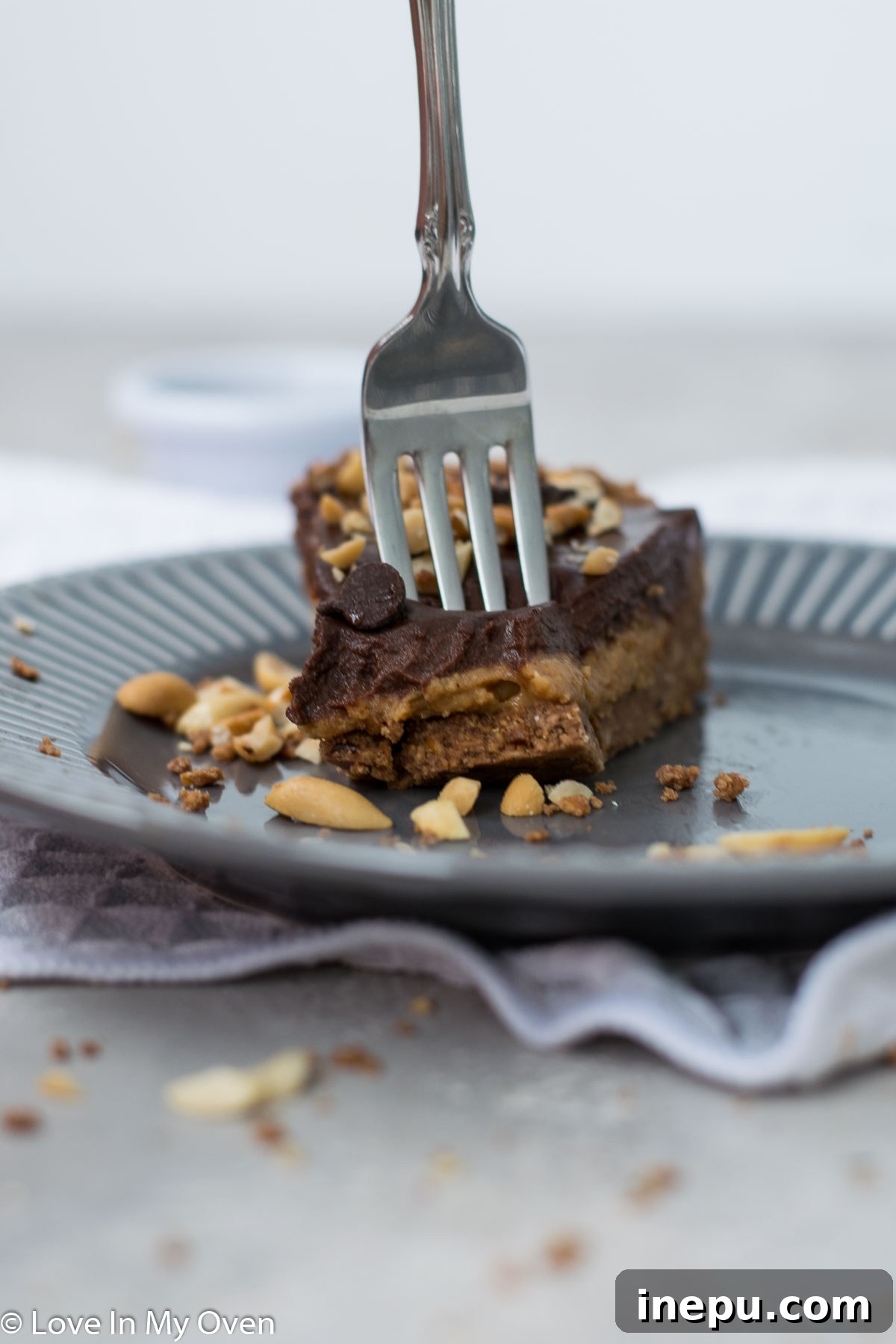 Salted Pretzel Caramel Chocolate Tart 10 Overhead shot of an entire Caramel Chocolate Pretzel Tart decorated with crushed pretzels