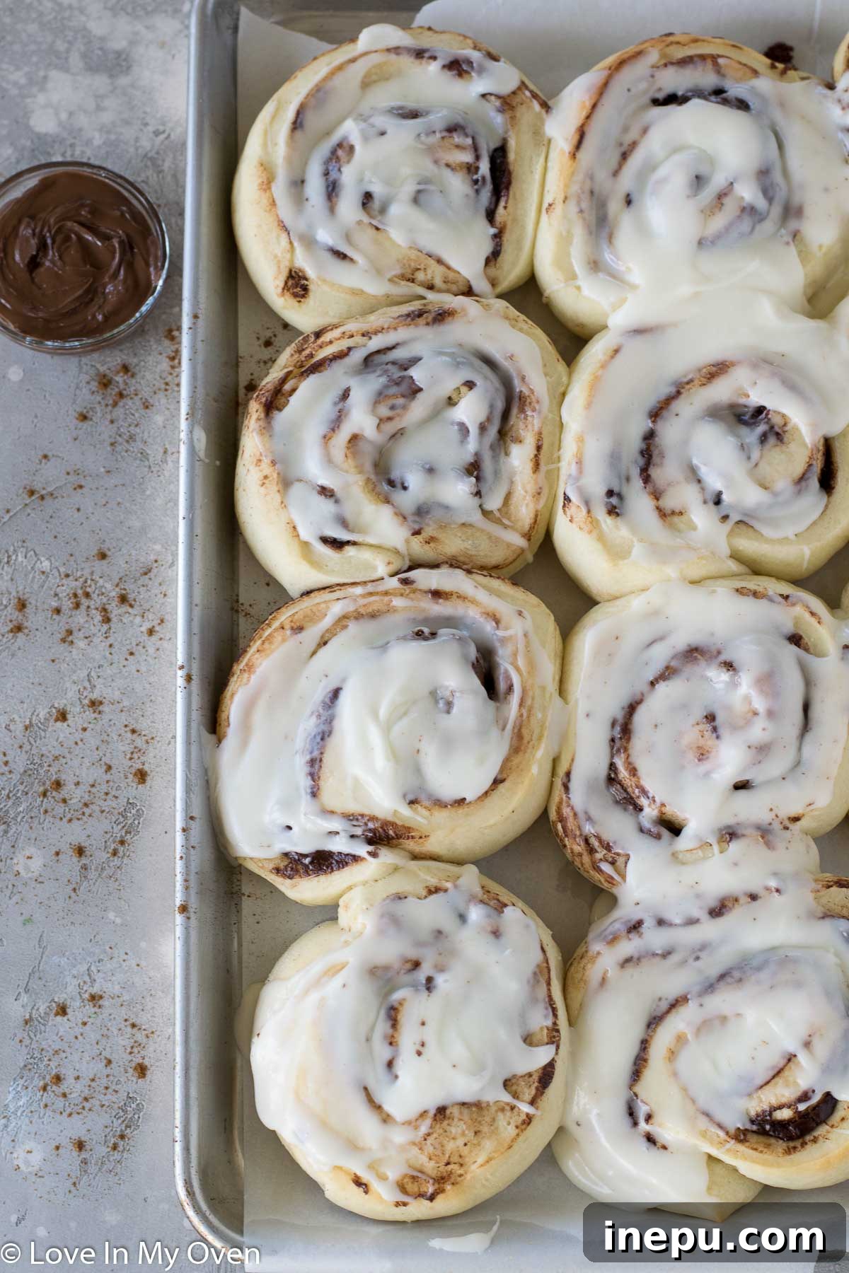 Irresistible Nutella Swirl Rolls 2 nutella cinnamon rolls with cream cheese frosting