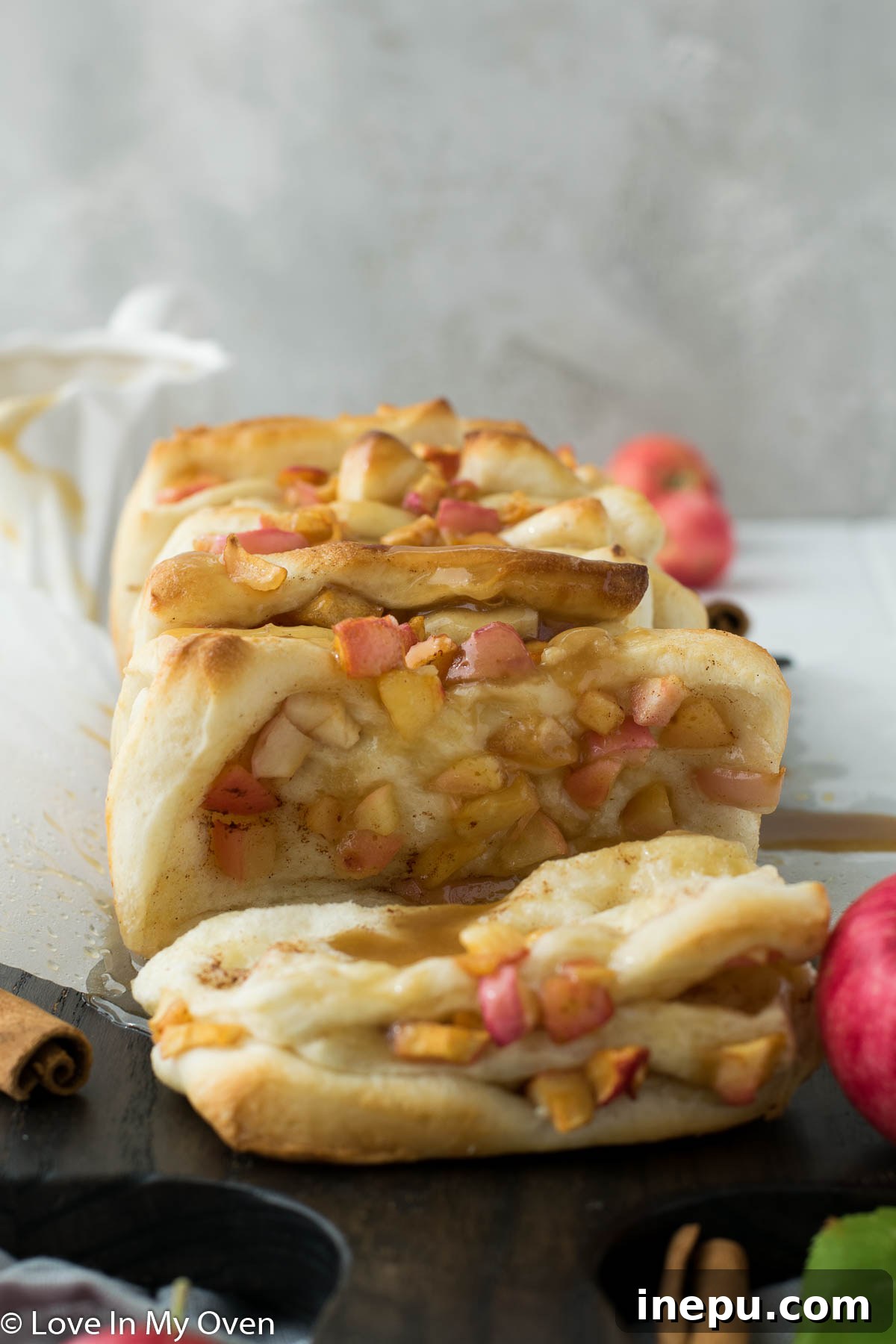Golden Apple Cinnamon Tear-Apart Bake 13 Slice of apple cinnamon pull apart bread with caramel