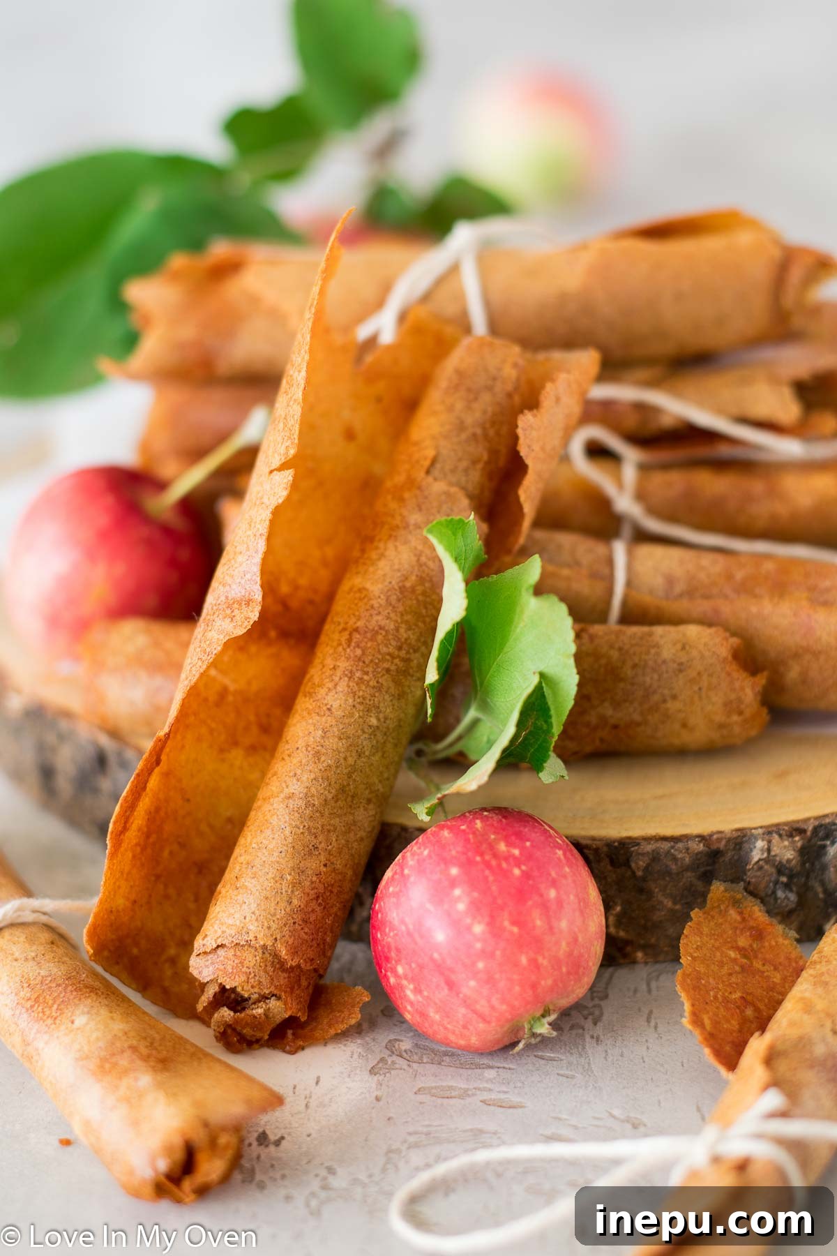 Freshly made apple fruit leather rolls, a healthy homemade snack.