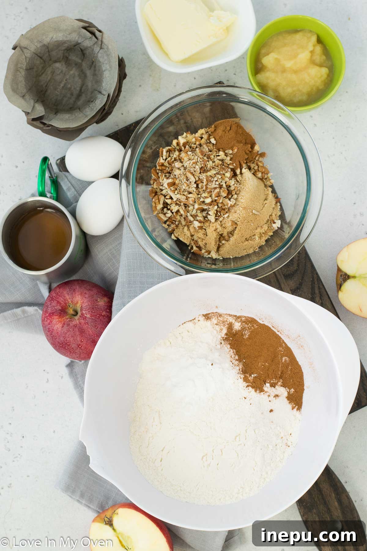 Harvest Spiced Cider Muffins 4 Dry ingredients for muffins (flour, baking powder, cinnamon, salt) in a mixing bowl.