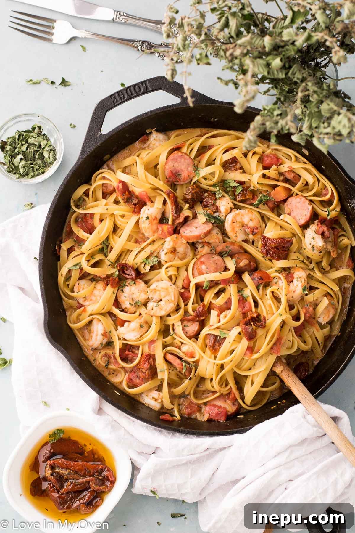 Hearty Shrimp and Sausage Pasta 7 Finished shrimp and sausage pasta in a skillet ready for serving