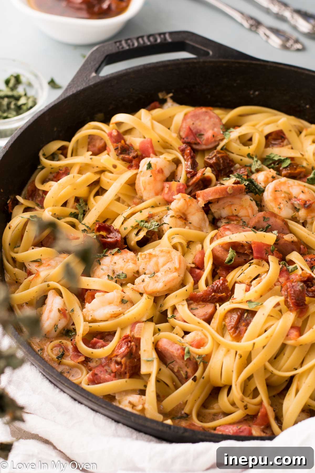 Hearty Shrimp and Sausage Pasta 8 Serving of shrimp and sausage pasta topped with fresh herbs
