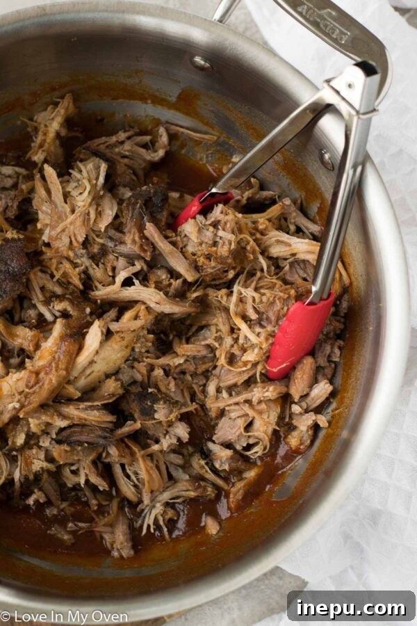 Apple Infused Pulled Pork 6 Apple cider pulled pork on a bun