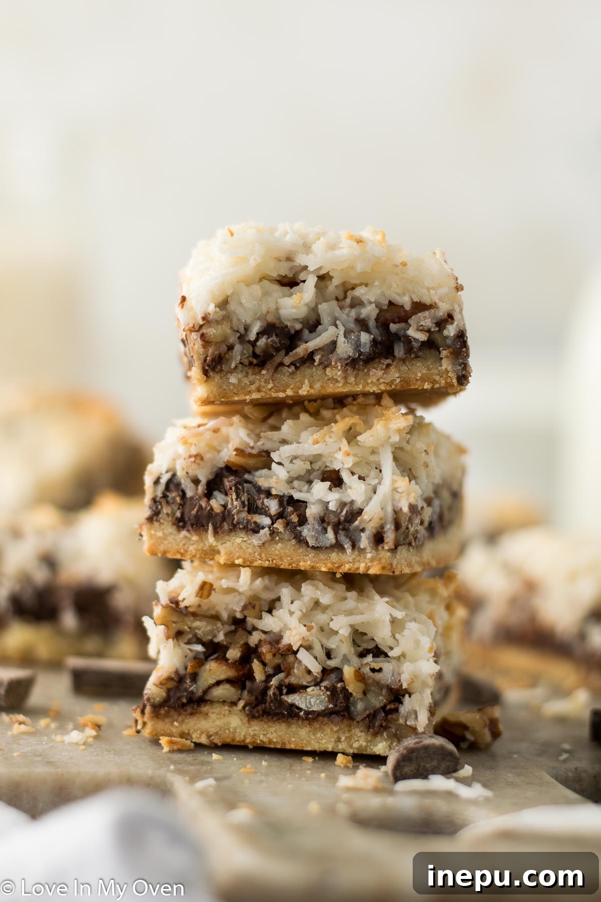Plant-Based Dream Bars 2 Delightful vegan magic bars layered with chocolate, pecans, and coconut.