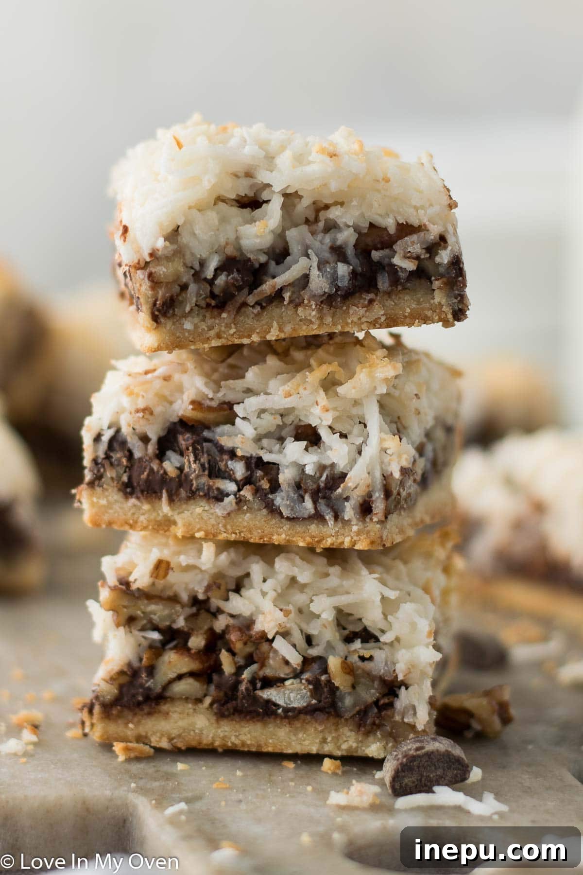 Plant-Based Dream Bars 11 Close-up of a single vegan magic bar, showing the distinct layers.