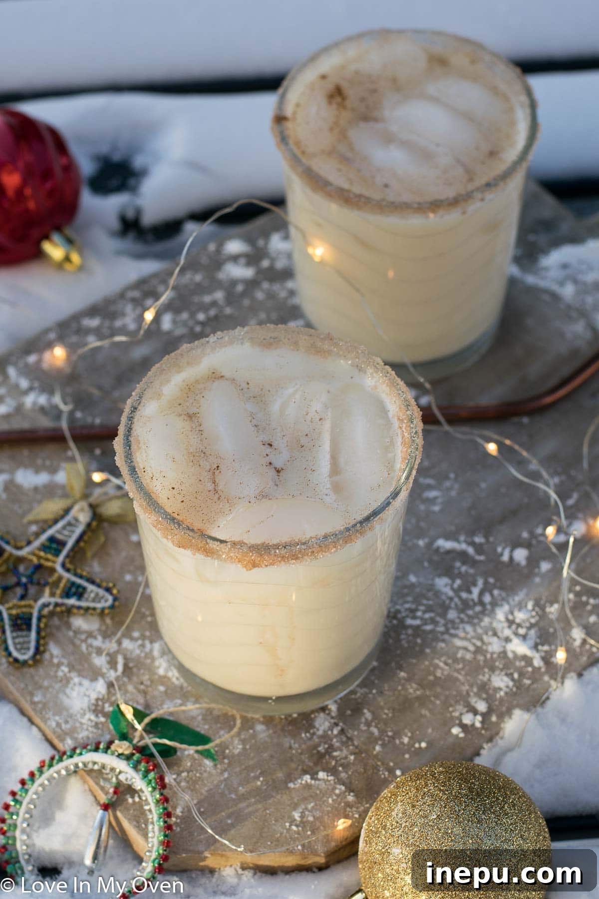 Velvet Vodka Nog 3 Close-up of Vodka Eggnog Cocktail with ice and cinnamon