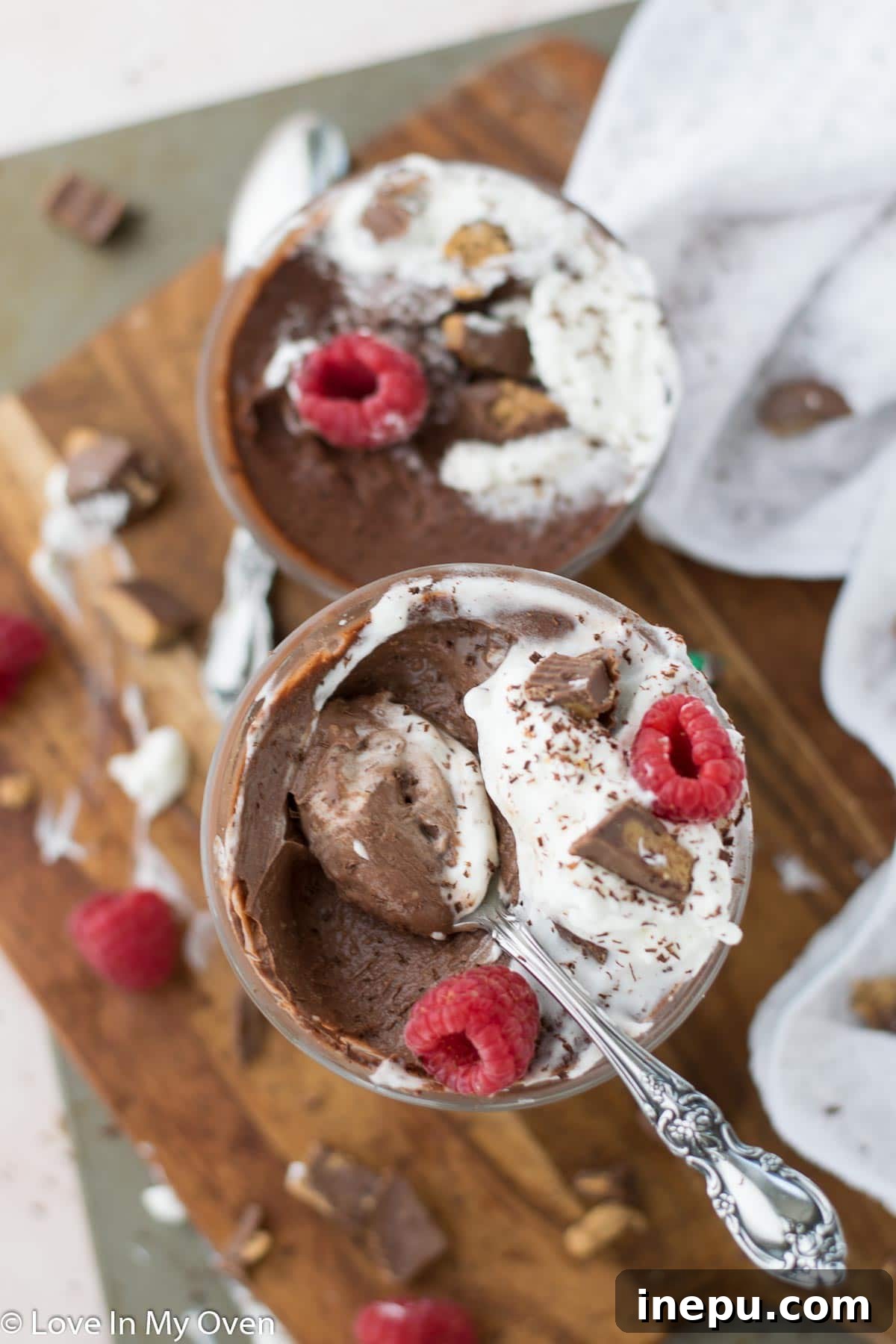 vegan chocolate peanut butter pudding topped with chocolate shavings