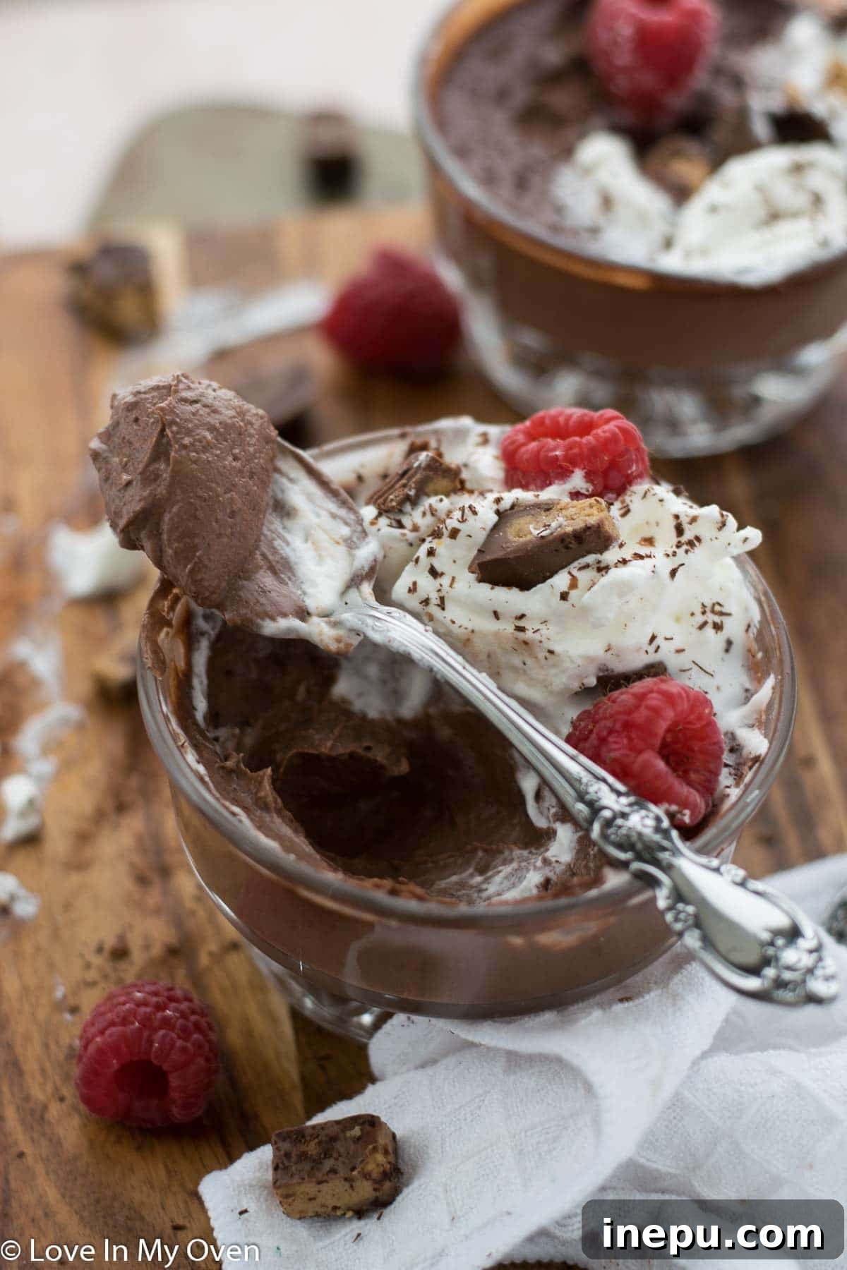 Two glasses of vegan chocolate peanut butter pudding