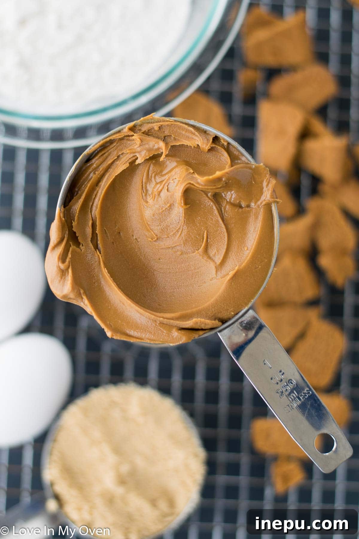 Mixing bowl with wet cookie dough ingredients