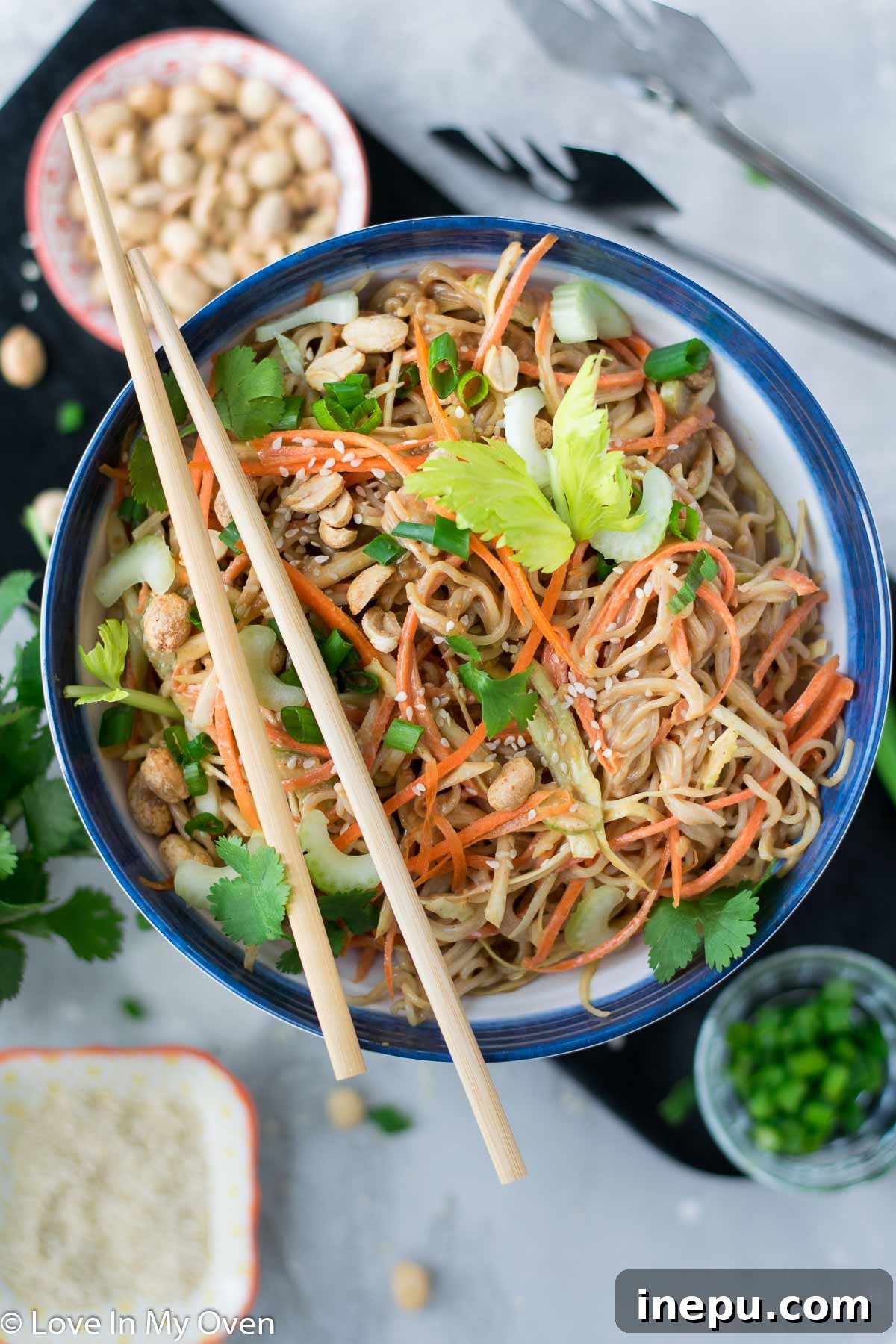 Vibrant Sesame Peanut Noodle Salad with fresh vegetables and creamy sauce