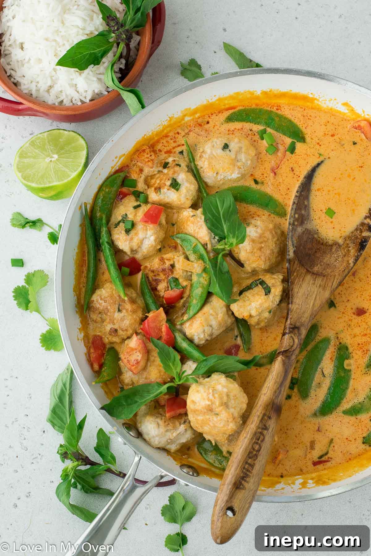 thai chicken meatballs in pan