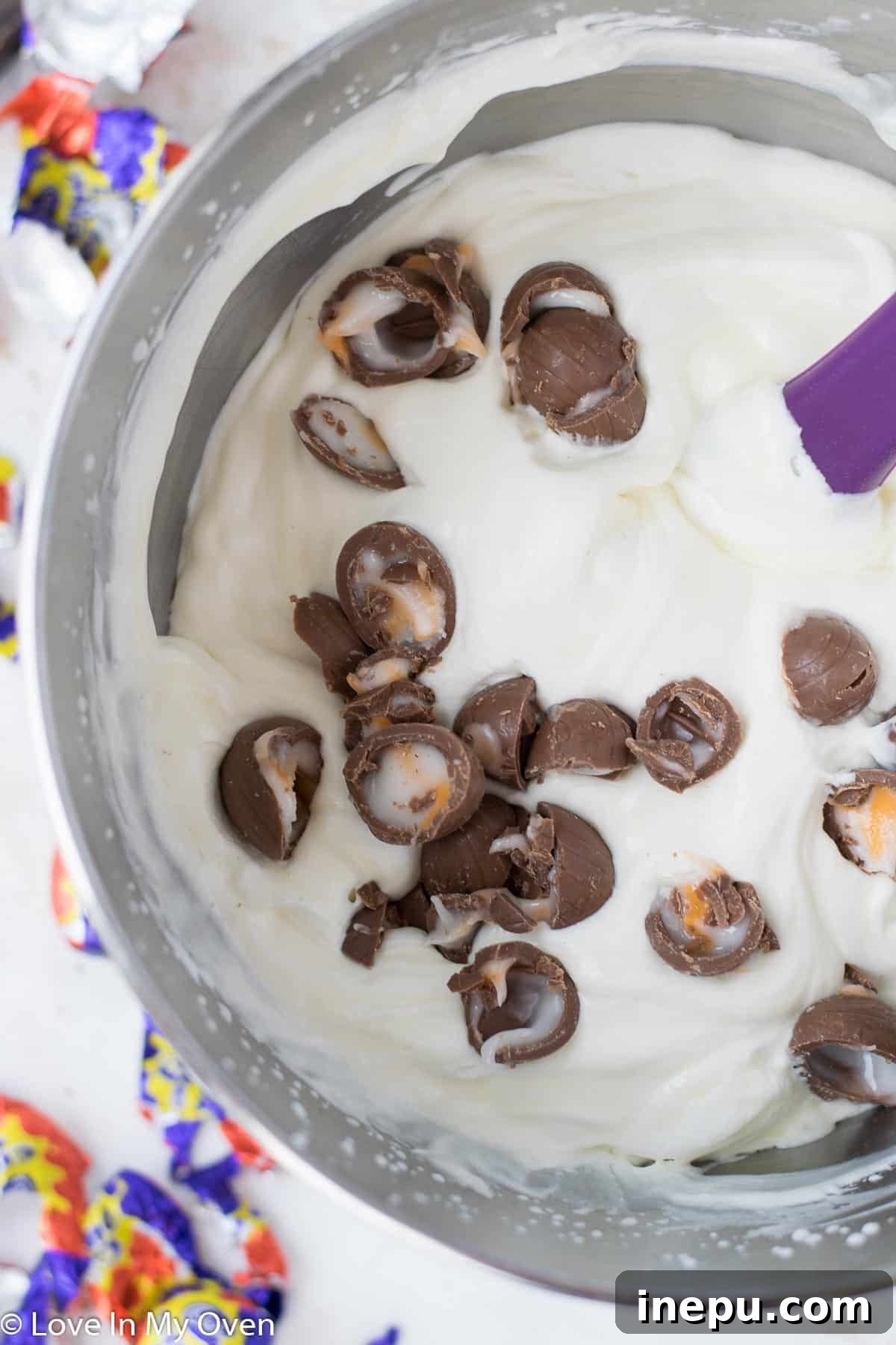 Silky Smooth Crème Egg Ice Cream 4 Layering the Crème Egg ice cream mixture with dulce de leche.