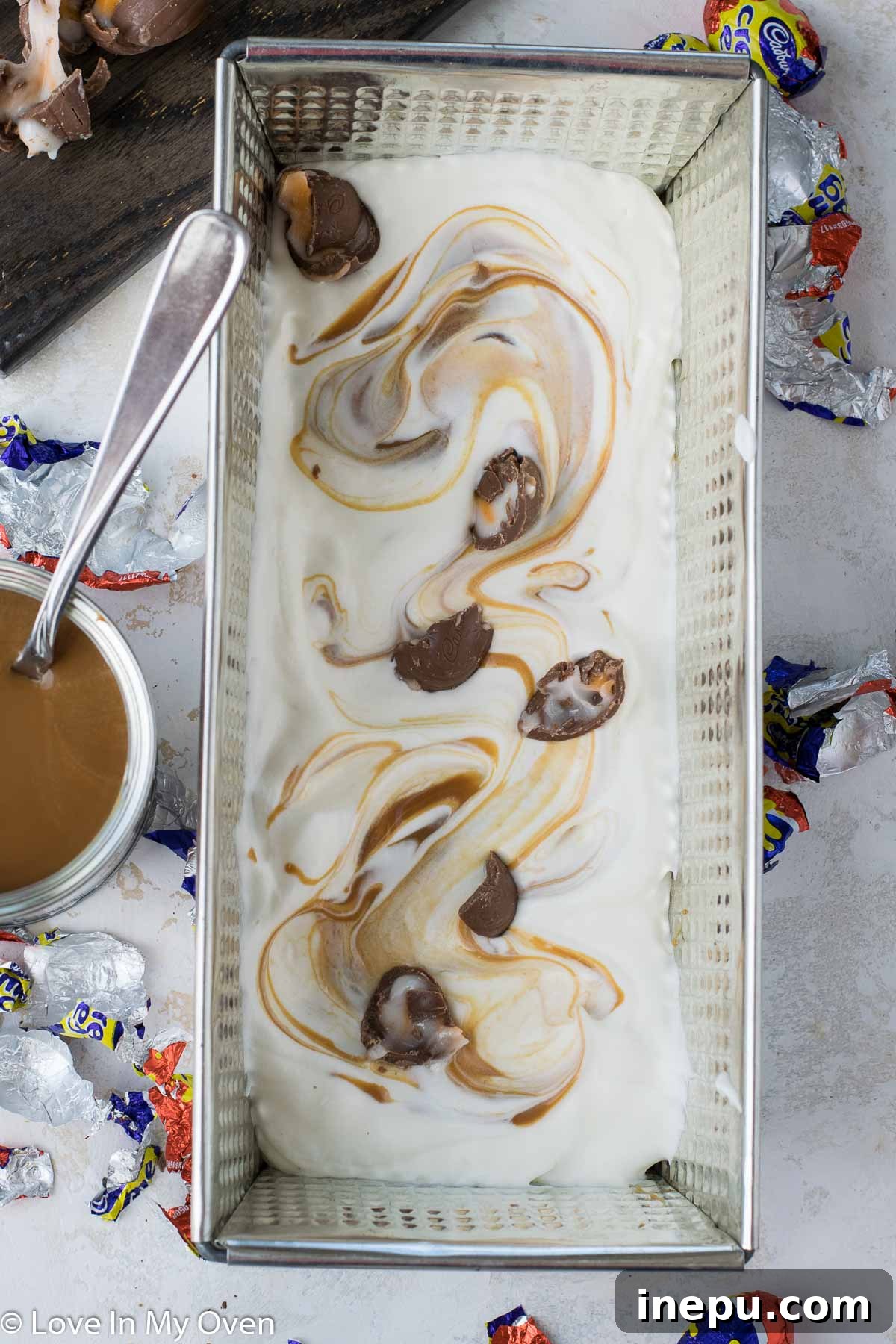Silky Smooth Crème Egg Ice Cream 5 Swirling caramel into the no-churn ice cream base.