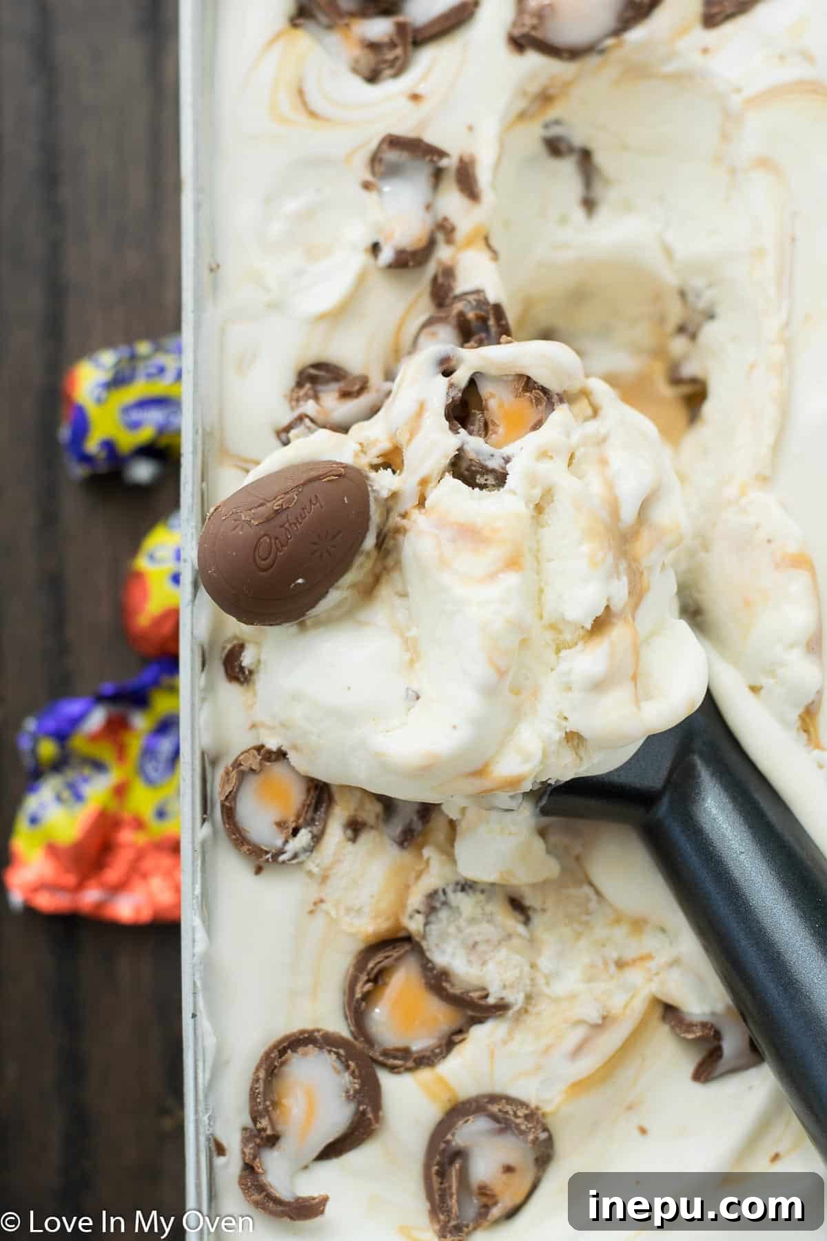Silky Smooth Crème Egg Ice Cream 7 Scooped Crème Egg ice cream in a bowl, showing the creamy texture and candy pieces.
