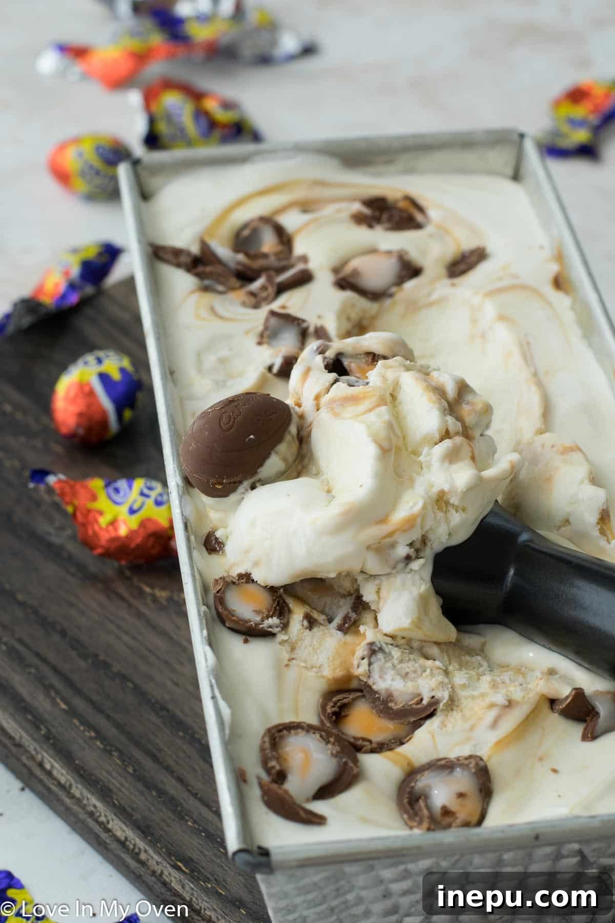 Silky Smooth Crème Egg Ice Cream 8 Close-up of Crème Egg ice cream with visible caramel swirls and chocolate chunks.