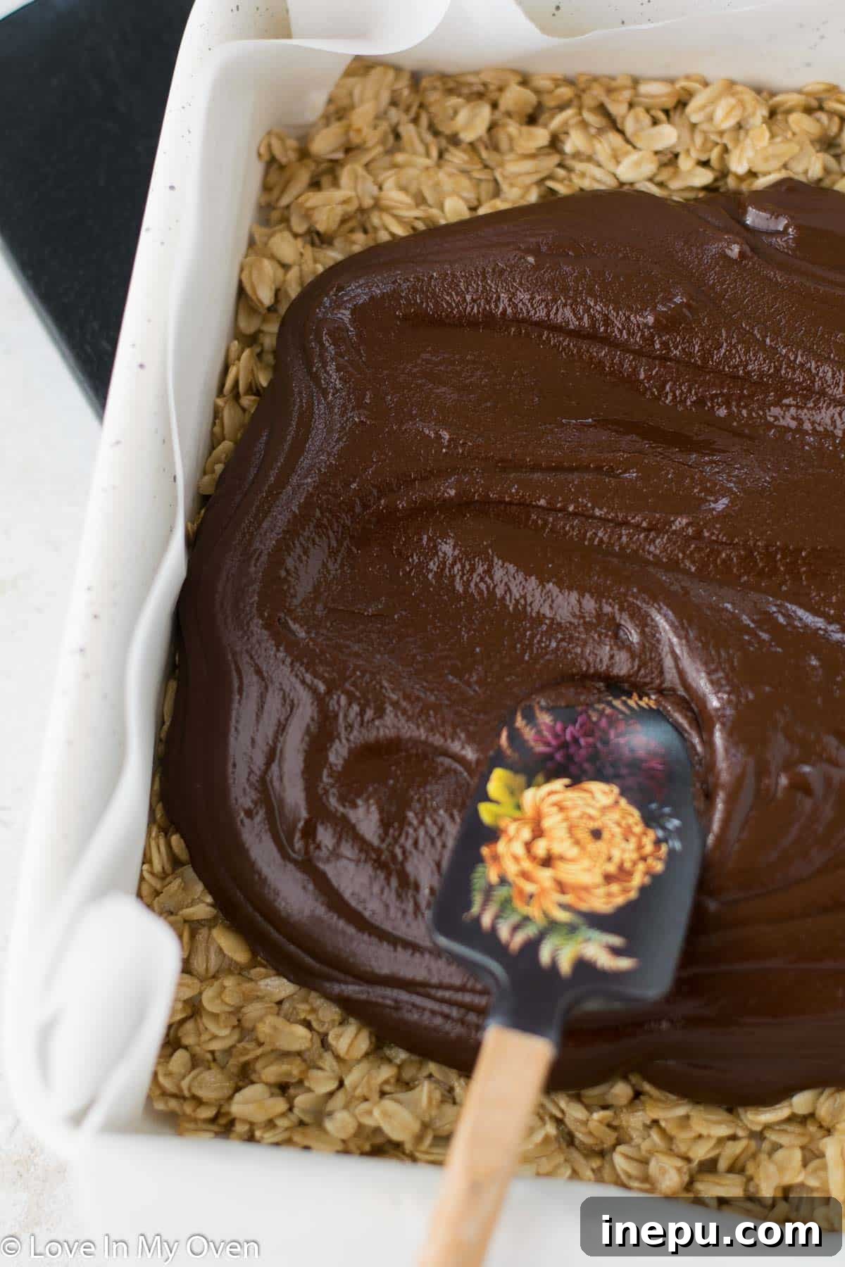 Assortment of gluten free oatmeal fudge bars on a plate