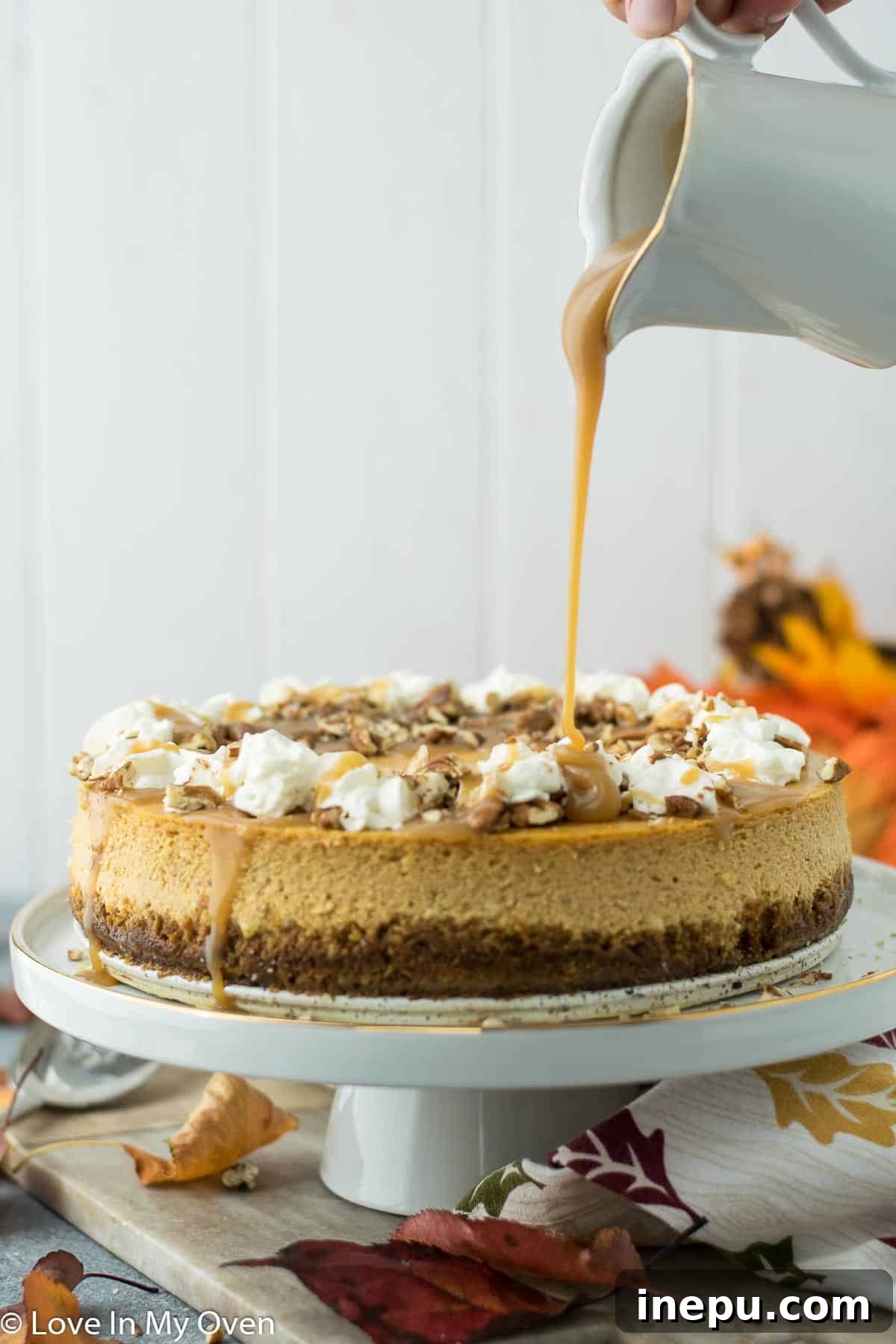 Pumpkin Caramel Cheesecake 6 Another perspective of the Caramel Pumpkin Cheesecake slice, emphasizing its creamy texture.