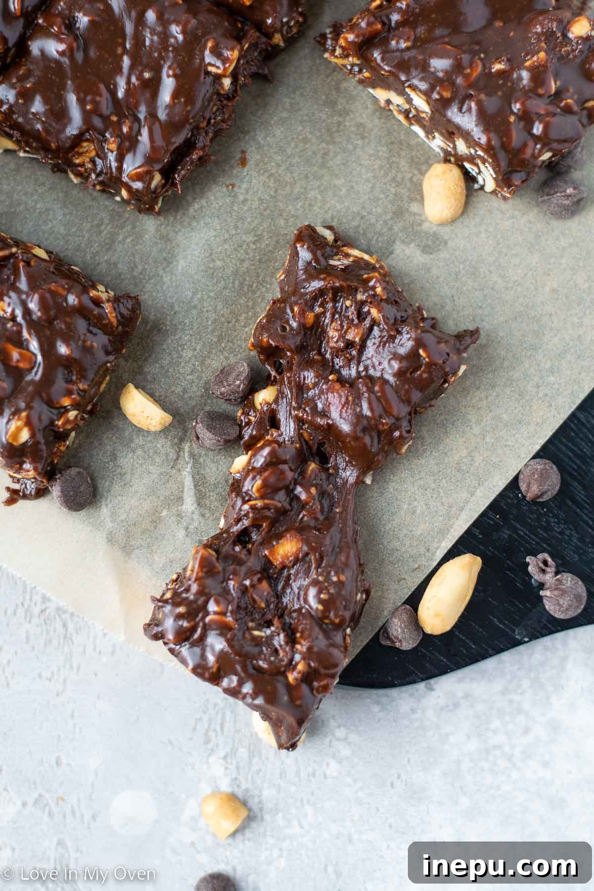 Nourishing Homemade Energy Bars 9 A close-up of a single homemade Eat-more bar on a white background