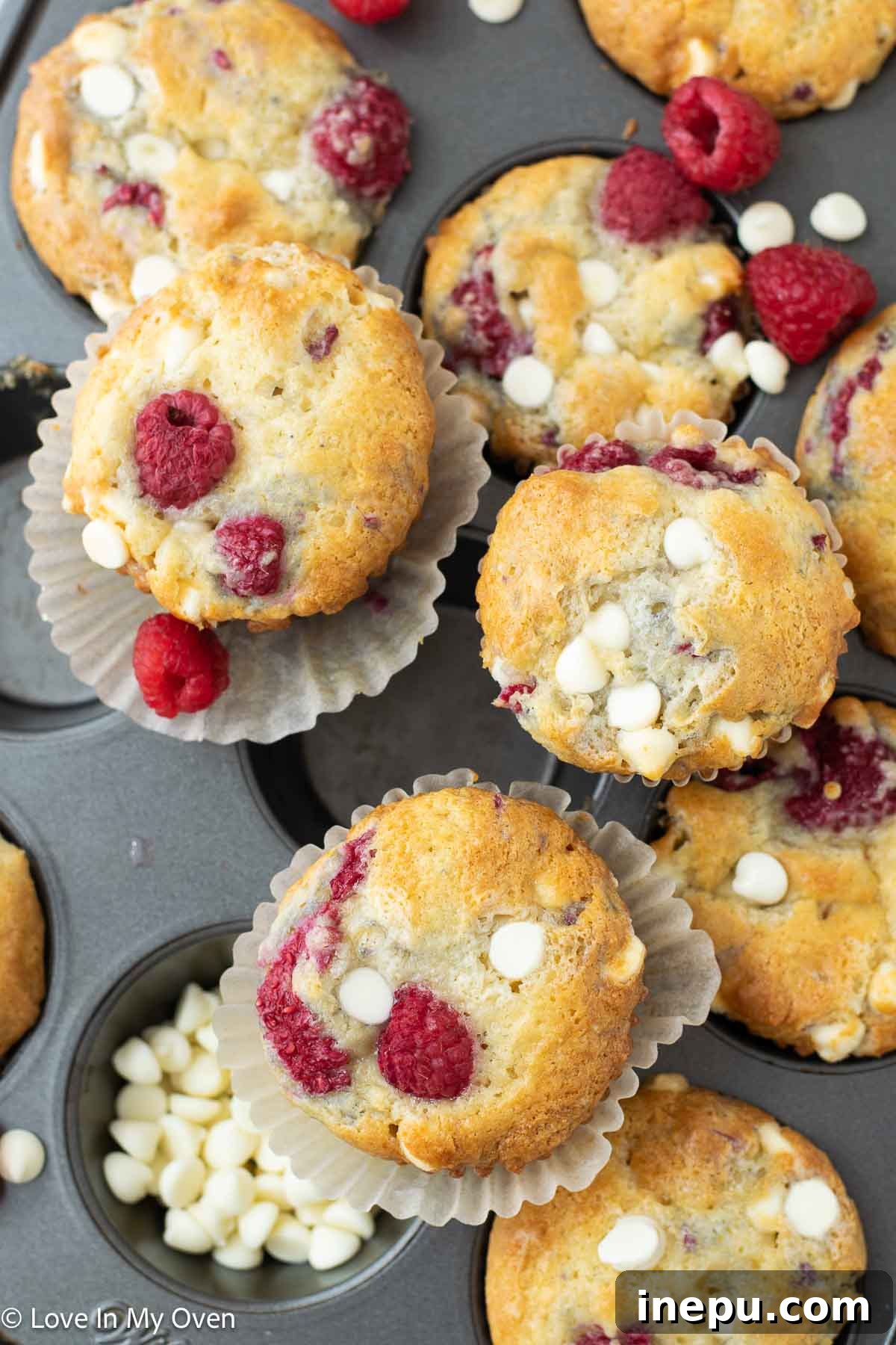 Luscious Raspberry White Chocolate Muffins 6 A basket of fresh, ripe raspberries, highlighting their vibrant color