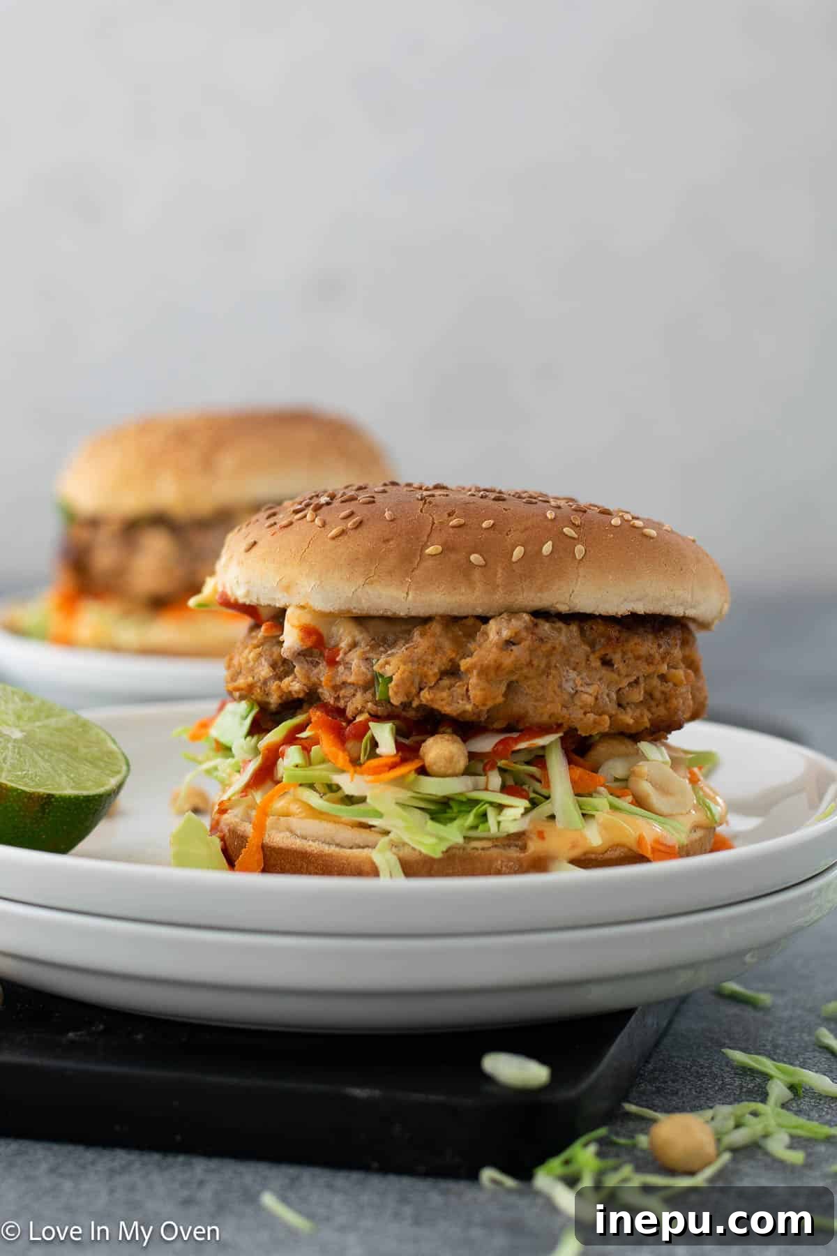 Flavorful Thai Turkey Burgers on a bun with fresh toppings