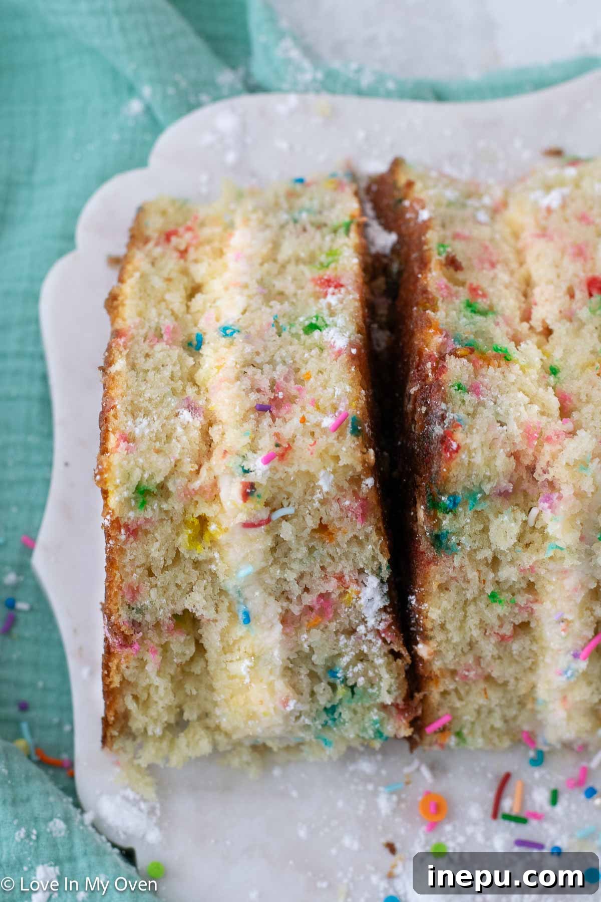Sweet Stacks 13 Plate of finished birthday cake sandwiches with festive sprinkles.
