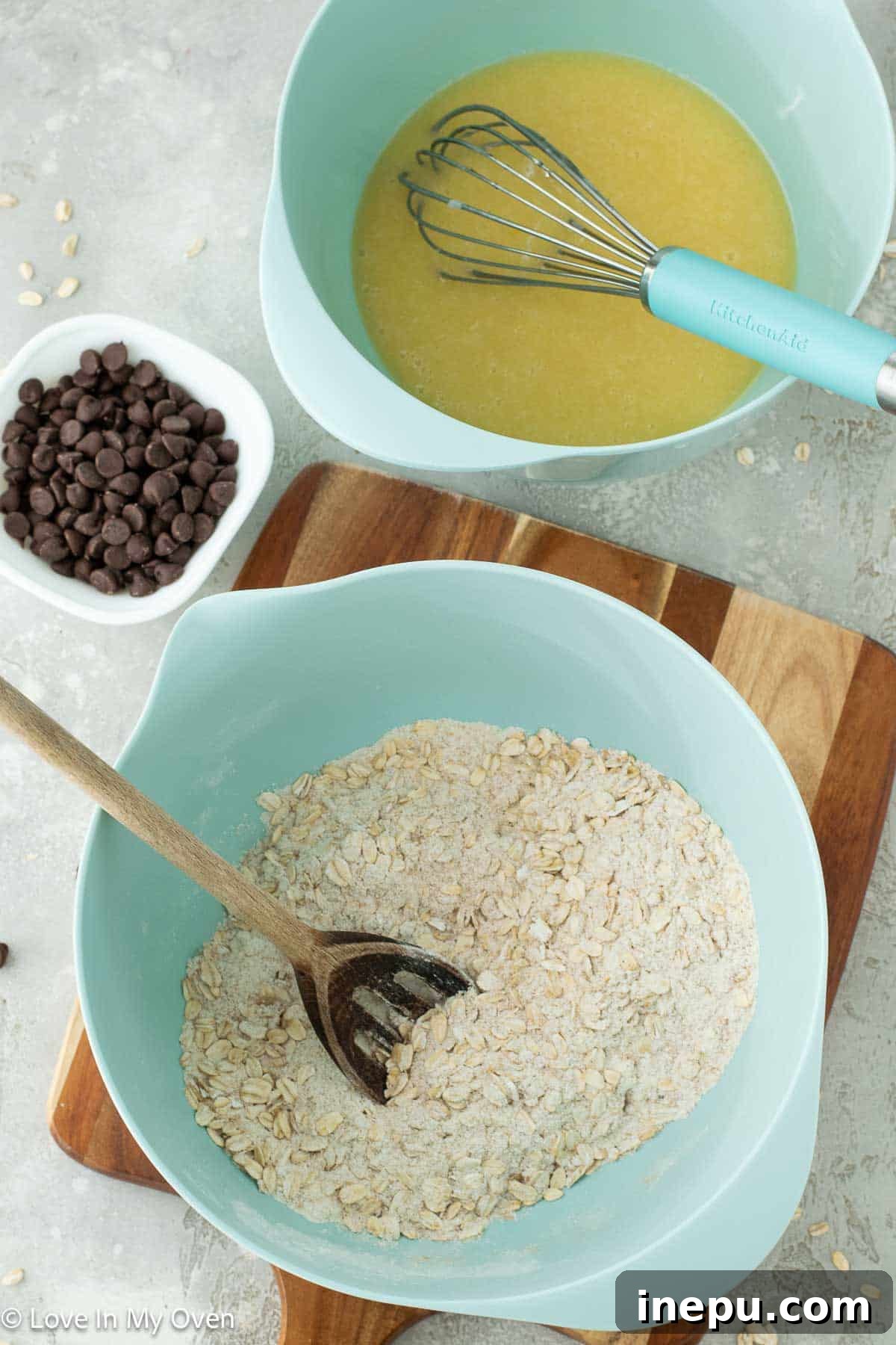 Healthier Oatmeal Chocolate Chip Muffins 4 Oatmeal chocolate chip muffins batter in tin before baking