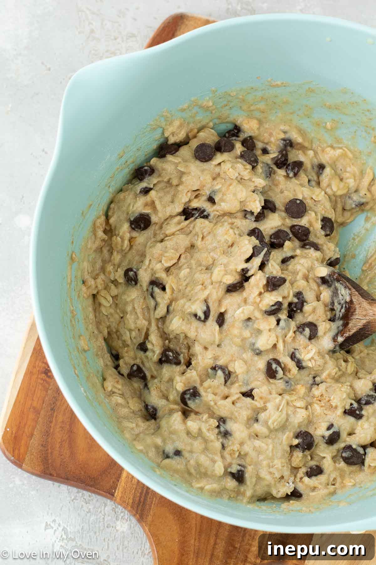 Healthier Oatmeal Chocolate Chip Muffins 6 Detailed shot of an oatmeal chocolate chip muffin