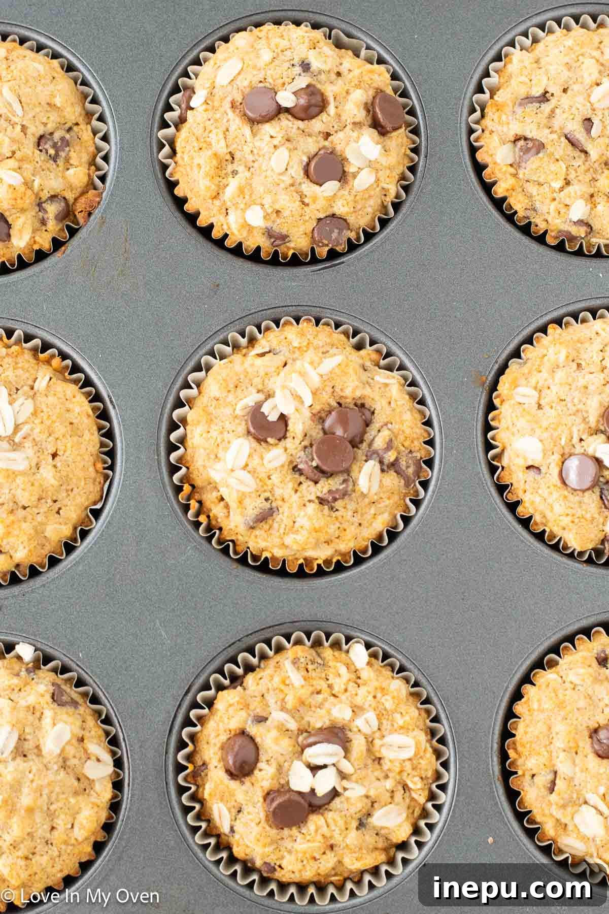 Healthier Oatmeal Chocolate Chip Muffins 8 Stacked oatmeal chocolate chip muffins