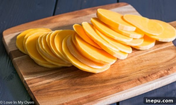 Butternachos 3 Thinly sliced butternut squash ready for roasting into chips.