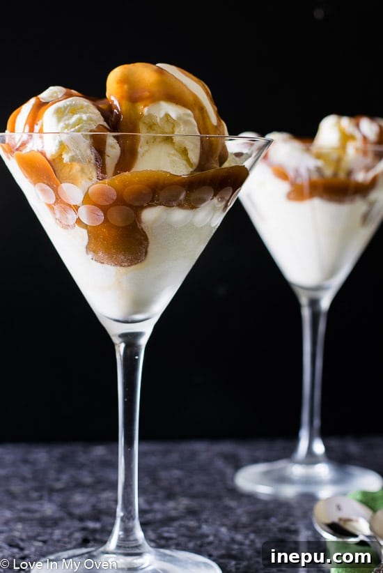 Salted caramel sauce in a bowl with a spoon, ready to serve