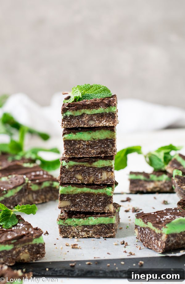 Delicious Mint Chocolate Nanaimo Bars arranged on a serving plate