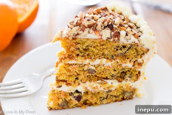 Sun-Kissed Carrot Indulgence 4 Orange-Carrot Cake with creamy frosting