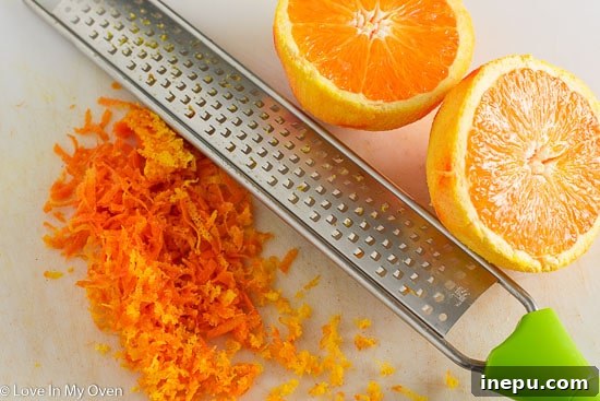 Sun-Kissed Carrot Indulgence 6 Orange slices next to shredded carrots
