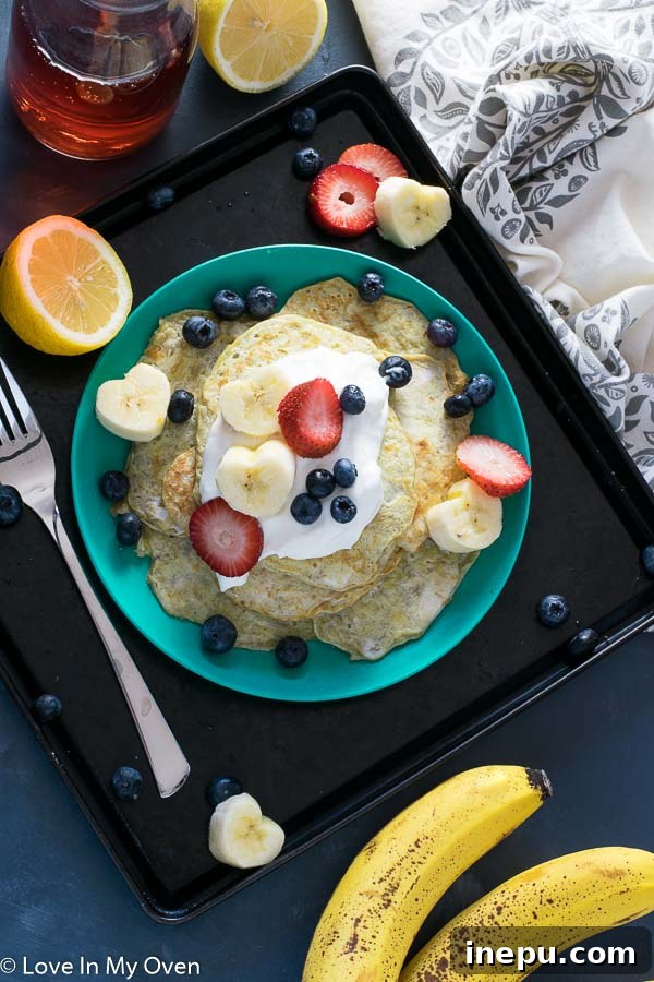 Dynamic Duo Flapjacks 2 baby-and-me pancakes - Two ingredient banana egg pancakes for an easy, healthy breakfast for toddlers and adults.