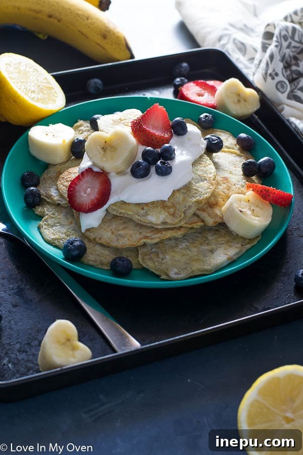 Dynamic Duo Flapjacks 8 Baby-and-me Pancakes - Stack of two ingredient pancakes with fruit.