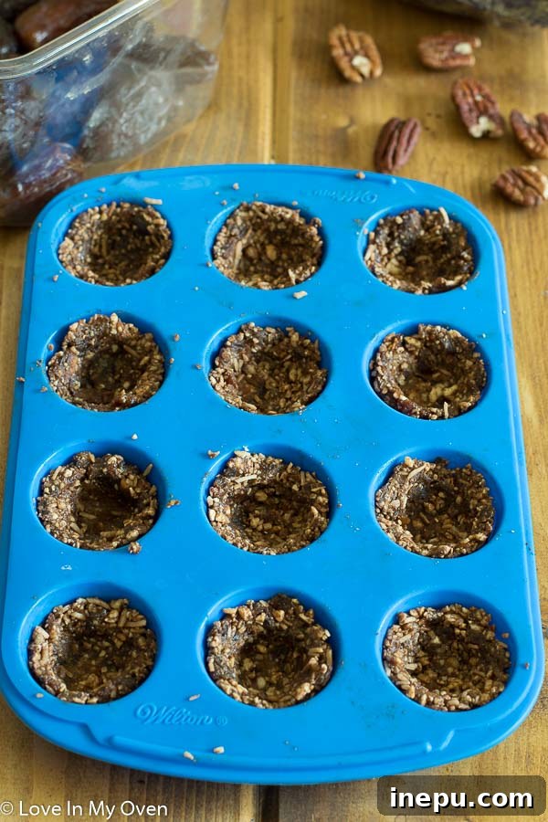 Guiltless Choco-Coconut Delights 5 Healthy Chocolate-Coconut Baskets in a muffin tin