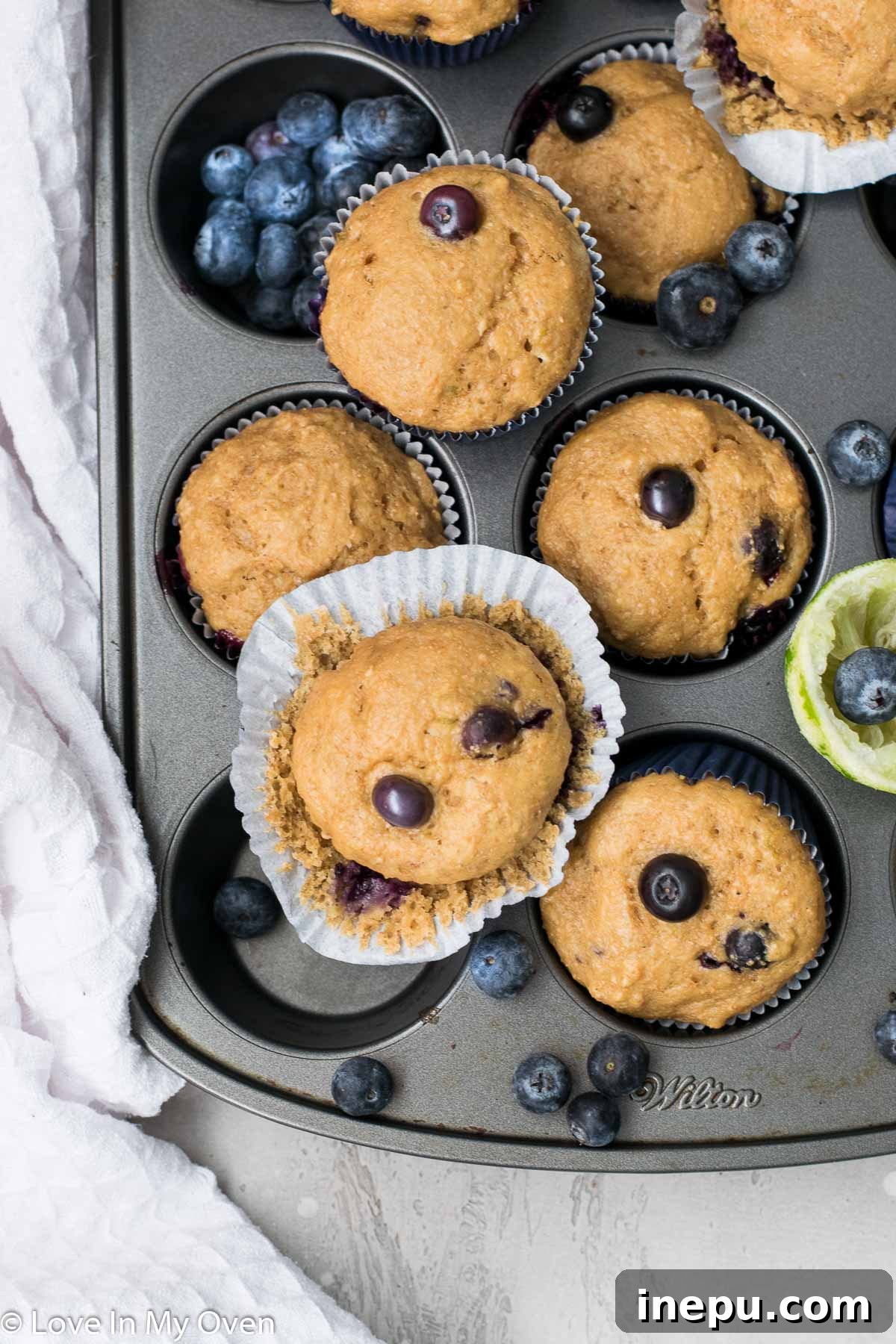 Zesty Blueberry Lime Greek Yogurt Muffins 7 Two Blueberry Lime Muffins with a hint of lime zest
