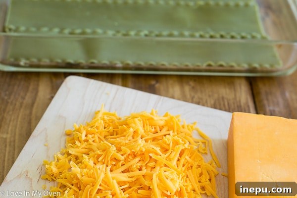 Effortless Perogies 6 Freshly shredded cheddar cheese, ready for the lazy perogy casserole filling.