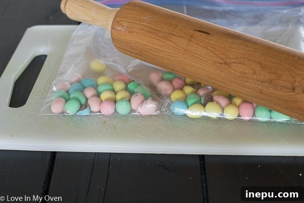 Preparing ingredients for mini egg skillet cookie, showcasing crushed mini eggs