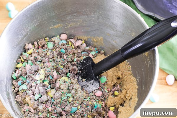 Mixing cookie dough ingredients in a stand mixer for the skillet cookie